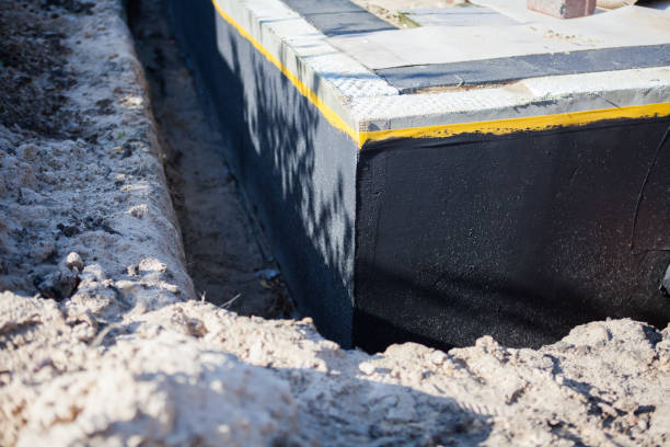 Professional Interior Drainage System technician working in Leslie, MI